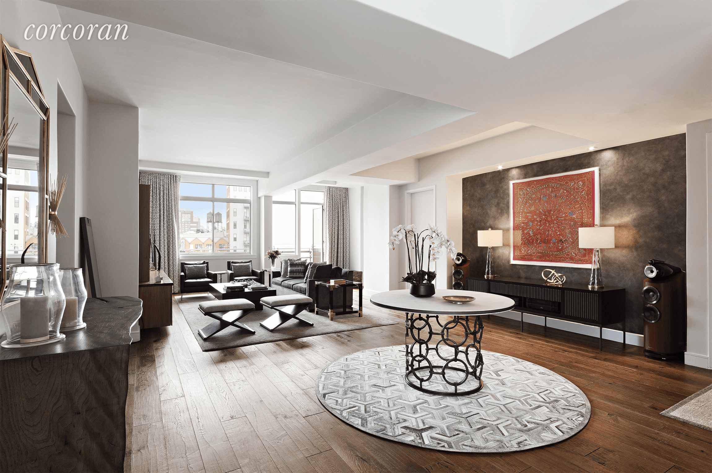 Nestled in the crossroads of SoHo, Nolita, and Tribeca, enjoy effortless convenience in this sprawling three bedroom, three and a half bathroom penthouse with private outdoor space.