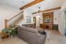 Family Room adjacent to striking staircase leading to Bonus & Media Rooms