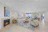 Virtually Staged - Living Room with electric fireplace and views of the water