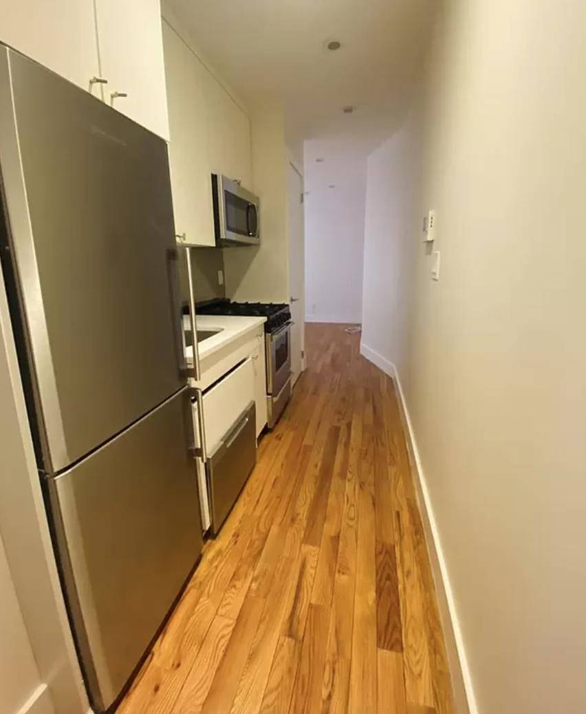 MUST SEE 3 BEDROOM ! Prime South Park Slope apartment featuring bleached plank floors, custom lacquer white kitchen with stainless steel appliances and a brand new subway tile bathroom.