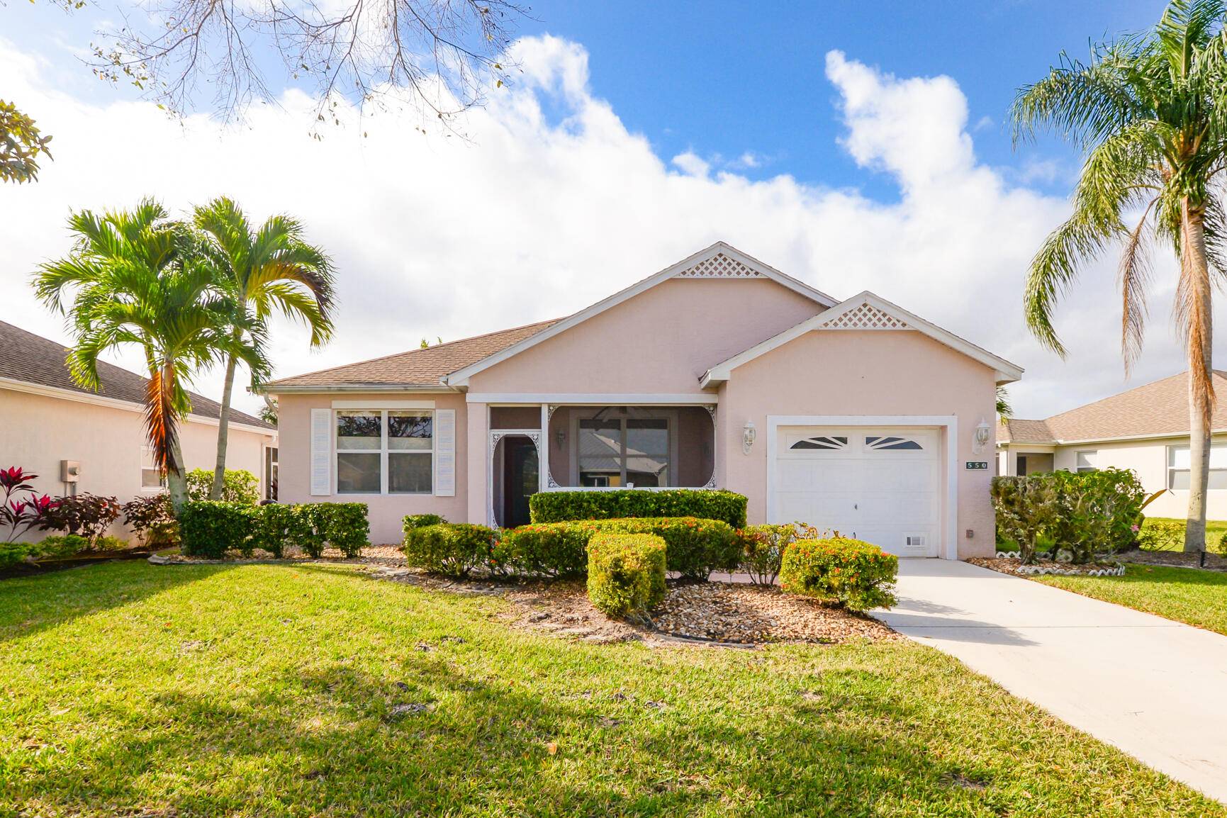 Lovely Lake Front Home in Isle of San Marino at Kings Isle 55 community in St Lucie West.