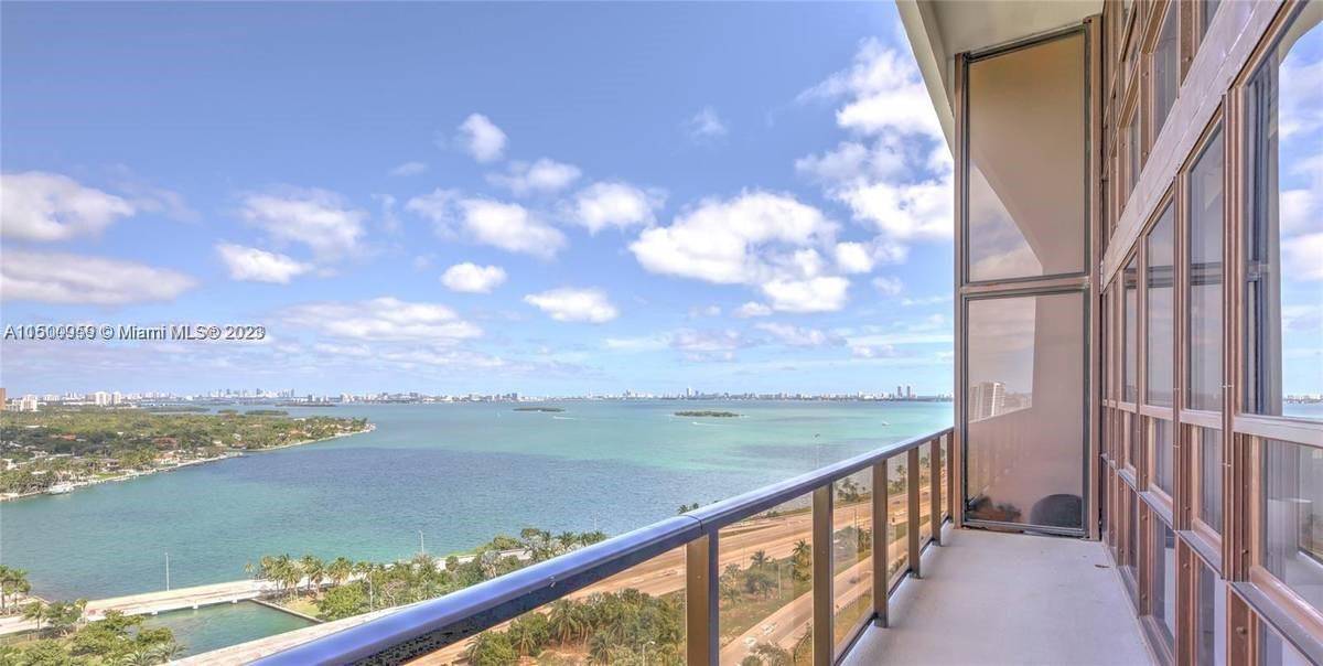 Ideal 2 bed, 2. 5 bath apartment featuring a large balcony that provides wonderful bay views ; wood floors, and captivating floor to ceiling windows.