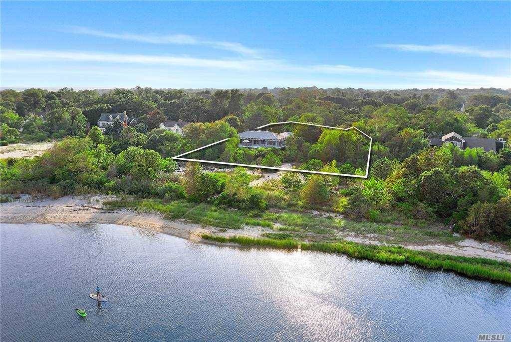Enjoy stunning water views across Peconic Bay to the South Fork from this contemporary beach house.