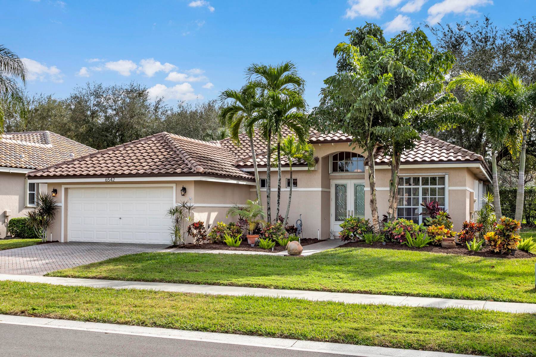 See this exquisite home located in the gated 55 plus community of Sandhurst at Jog Estates.