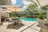 Screened pool area offering the perfect place to relax or entertain while enjoying peaceful farm views