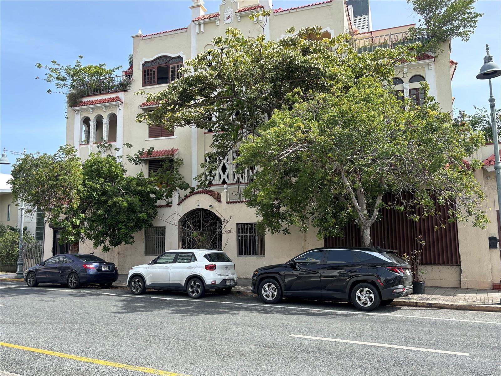 Retail, warehouse, garage and storage in the historic Victory Garden building. Retail space is located behind the tree and also has entrances to all a