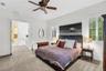 Spacious primary suite with en suite bathroom and walk-in closet