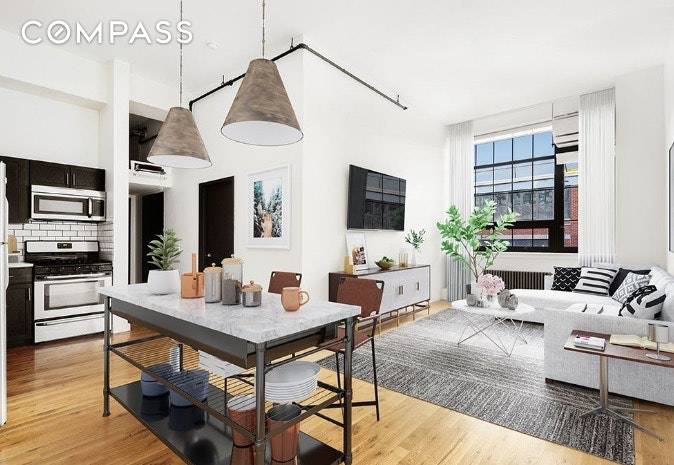 Residence 308 is a rare and authentic loft with 12' ceilings and features three bedrooms and one full bathroom.