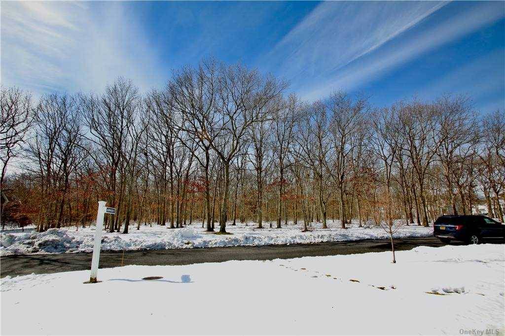 Wooded lot close proximity to Nesconset Hwy Located at end of Woodcrest Estates on Woodcrest Drive