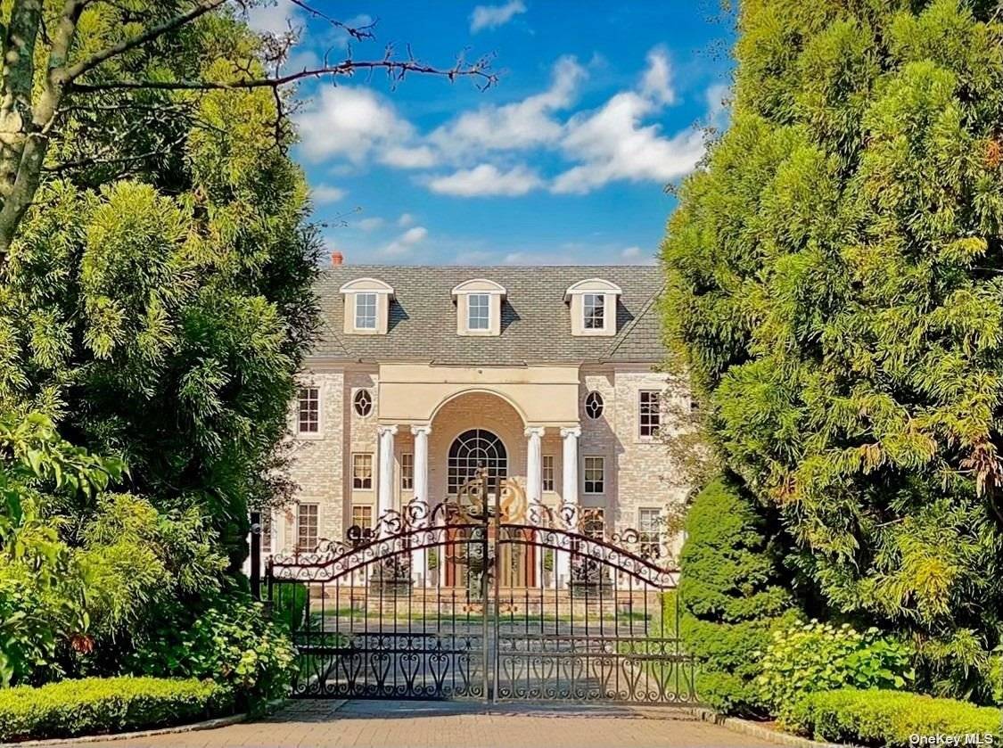 Magnificent gated entry and elegantly manicured gardens lead to a stunning fountained courtyard and handsome hardscape welcoming you to this breathtaking 12, 000 sq ft Custom Masterpiece.