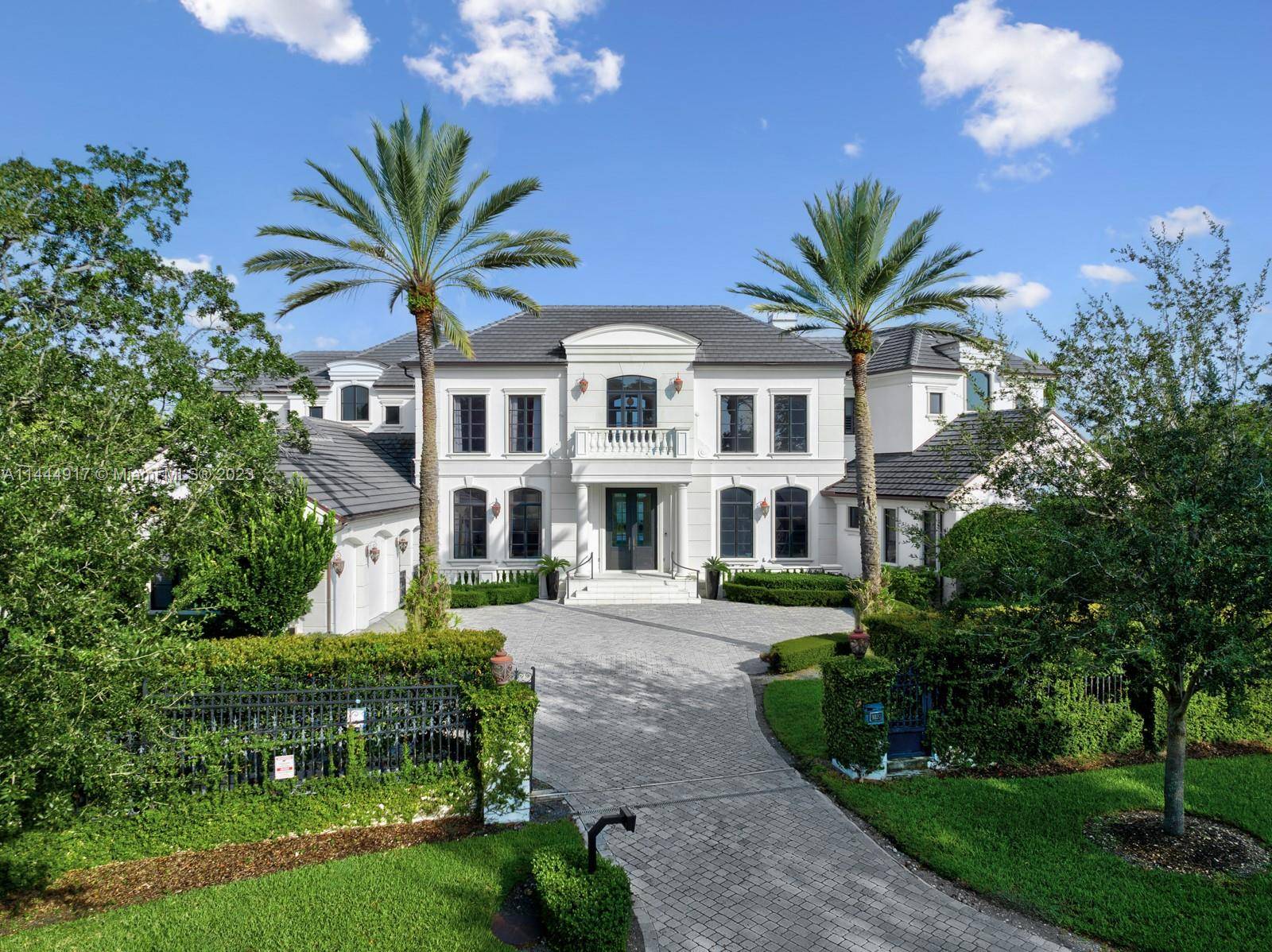 In the highly coveted gated Coral Gables community of Old Cutler Bay, this stunning residence was designed by famed architect Ramon Pacheco remodeled in 2015 offering modern luxury living.