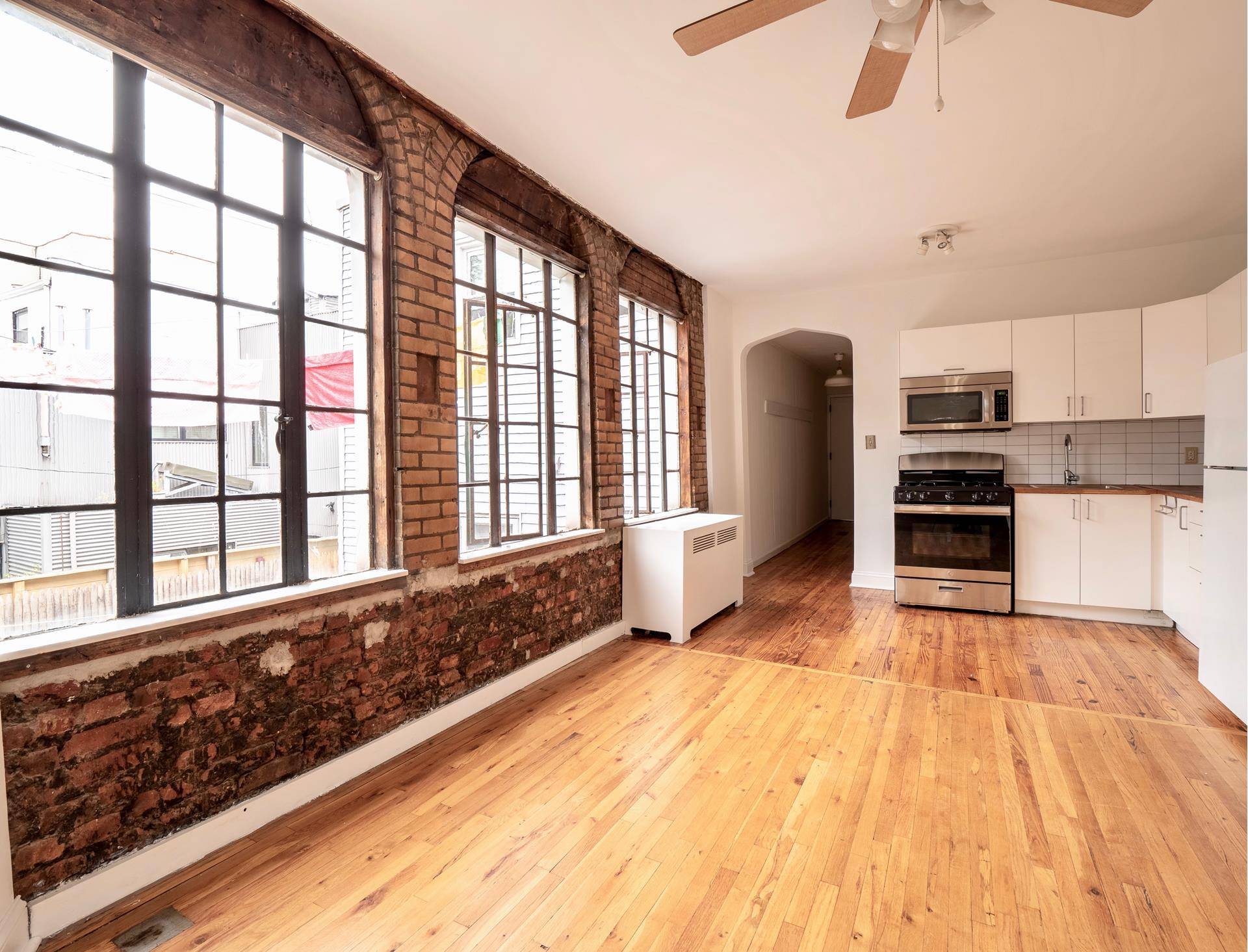 Two bedroom home with excellent light and exposed brick.