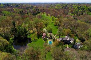 Unparalleled beauty, sweeping acreage and an incomparable retreat in the heart of New Canaan.