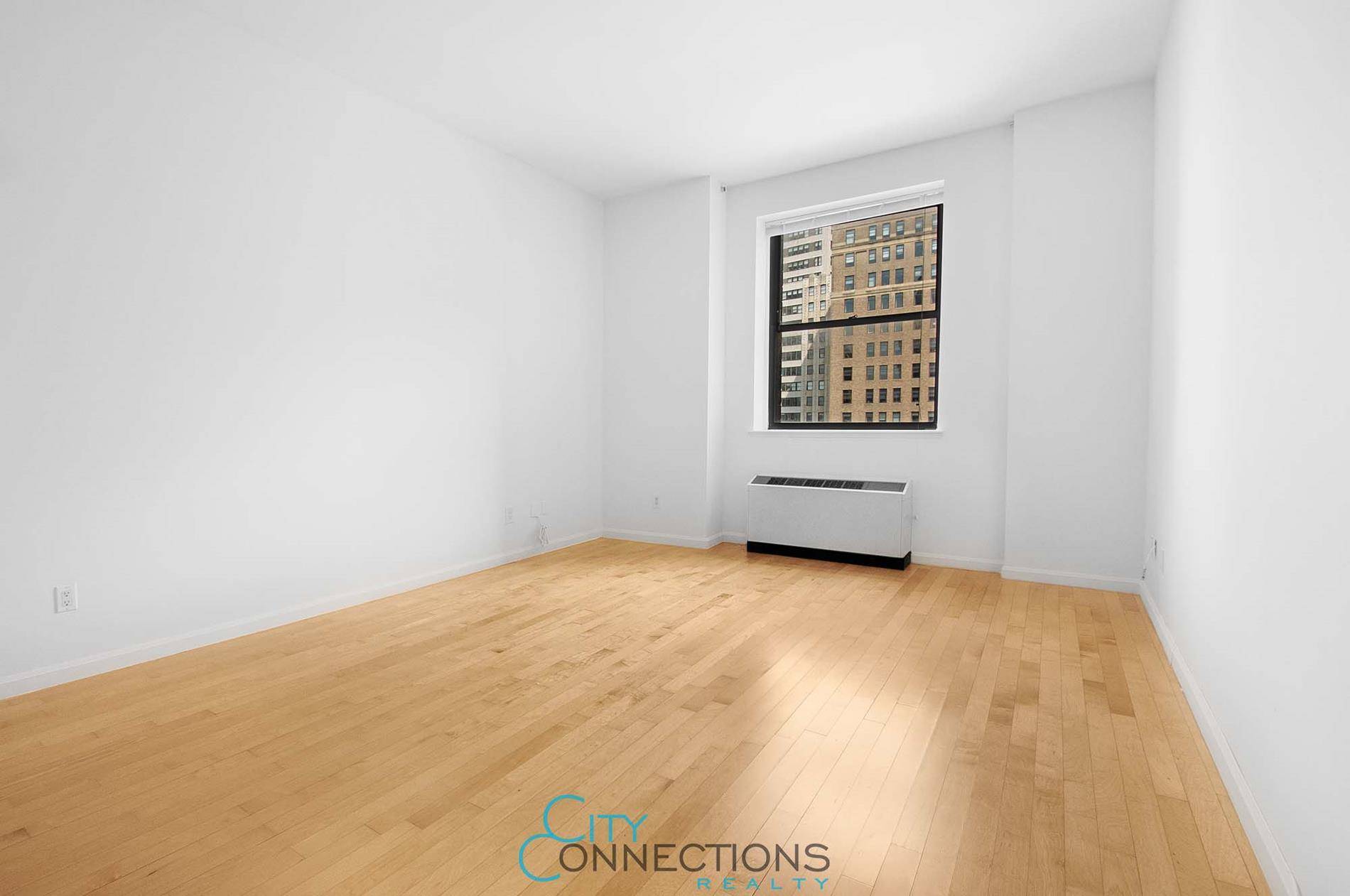 Spacious, bright and airy loft studio in the Financial District !