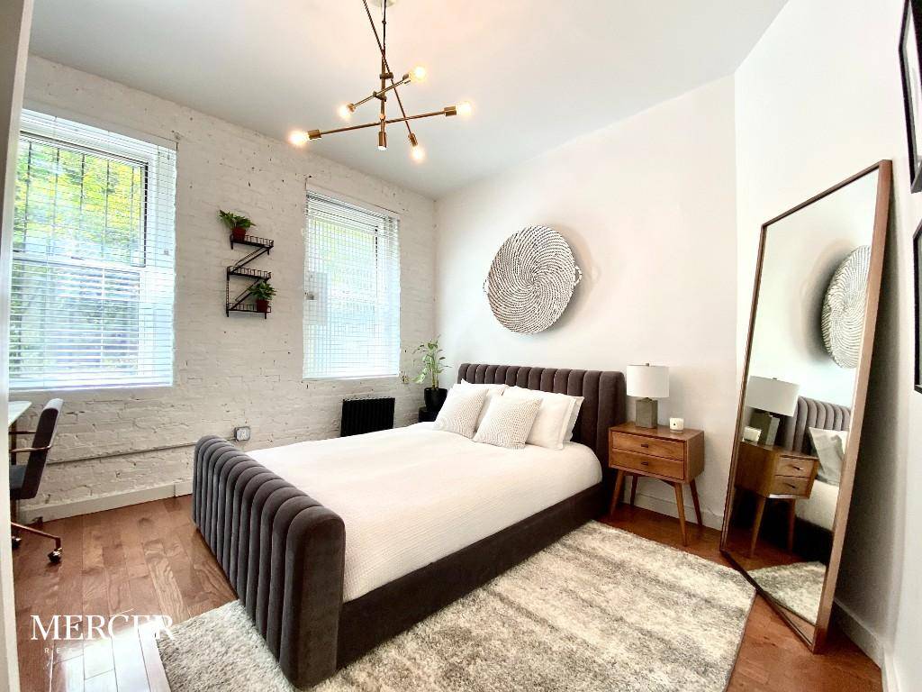 This meticulously renovated and beautifully designed one bedroom co op in the East Village offers Southern exposure with a flood of natural light and features custom blinds !