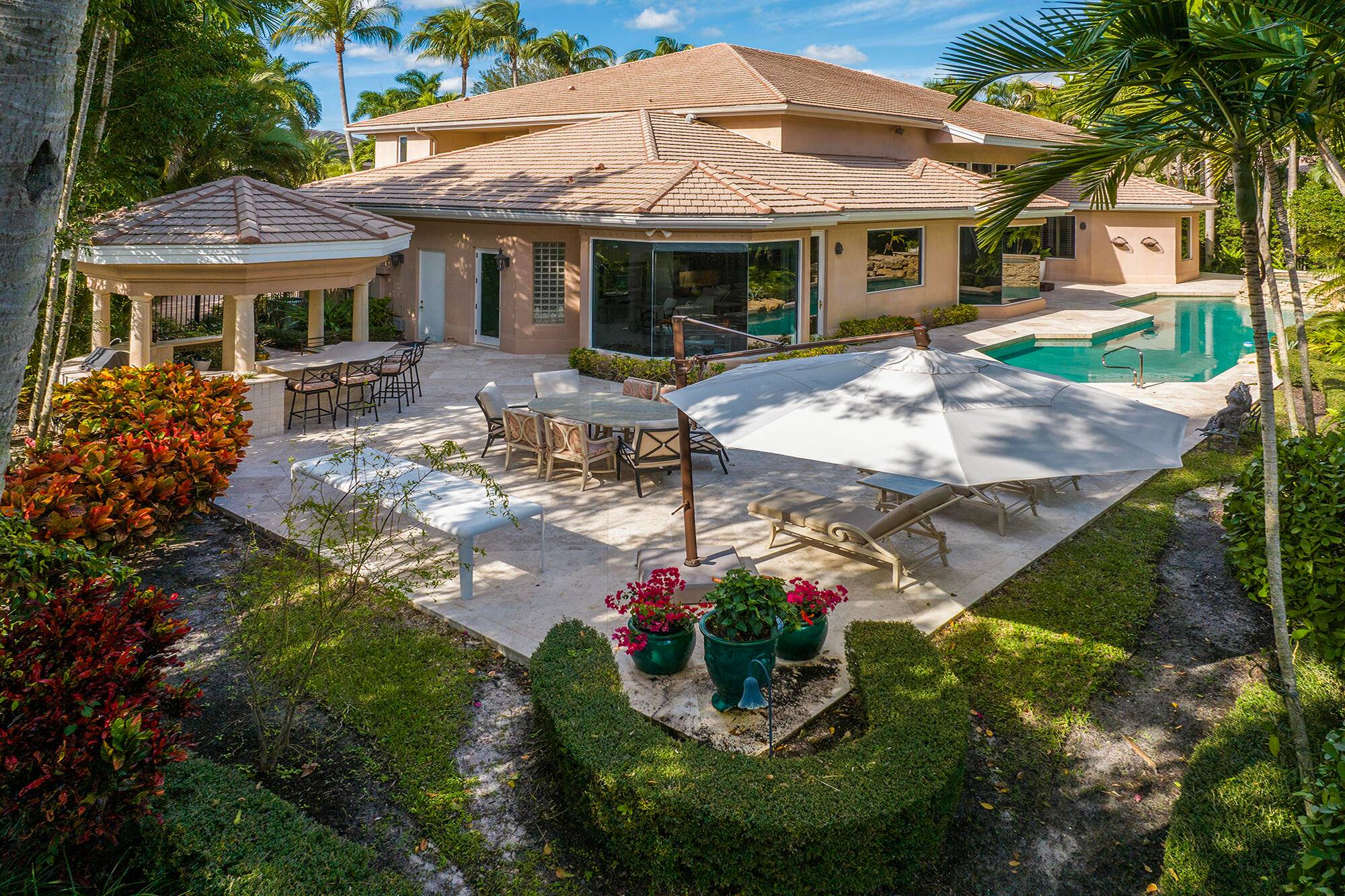 Welcome to the epitome of luxury living in the exclusive Oakbrook enclave of Boca West Country Club.