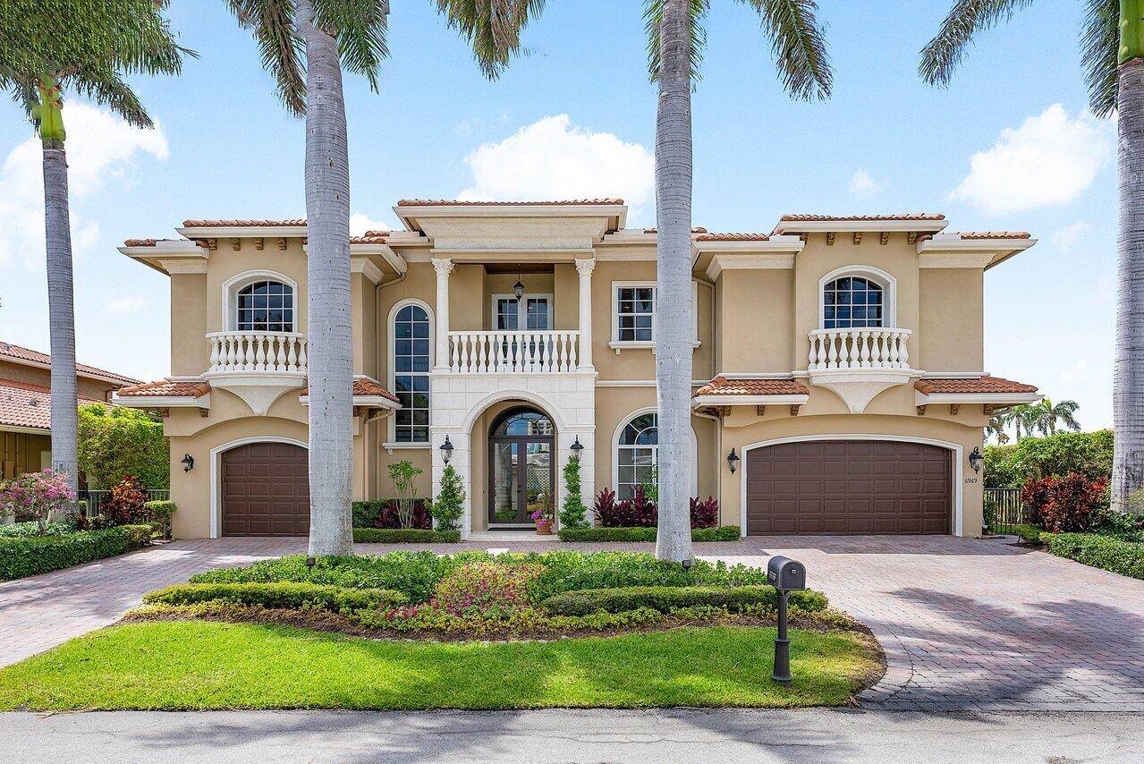 Nestled on the serene shores of Boca Harbour Island, 6969 NE 8th Drive in Boca Raton, Florida, unveils a waterfront haven that epitomizes luxury living at its finest.