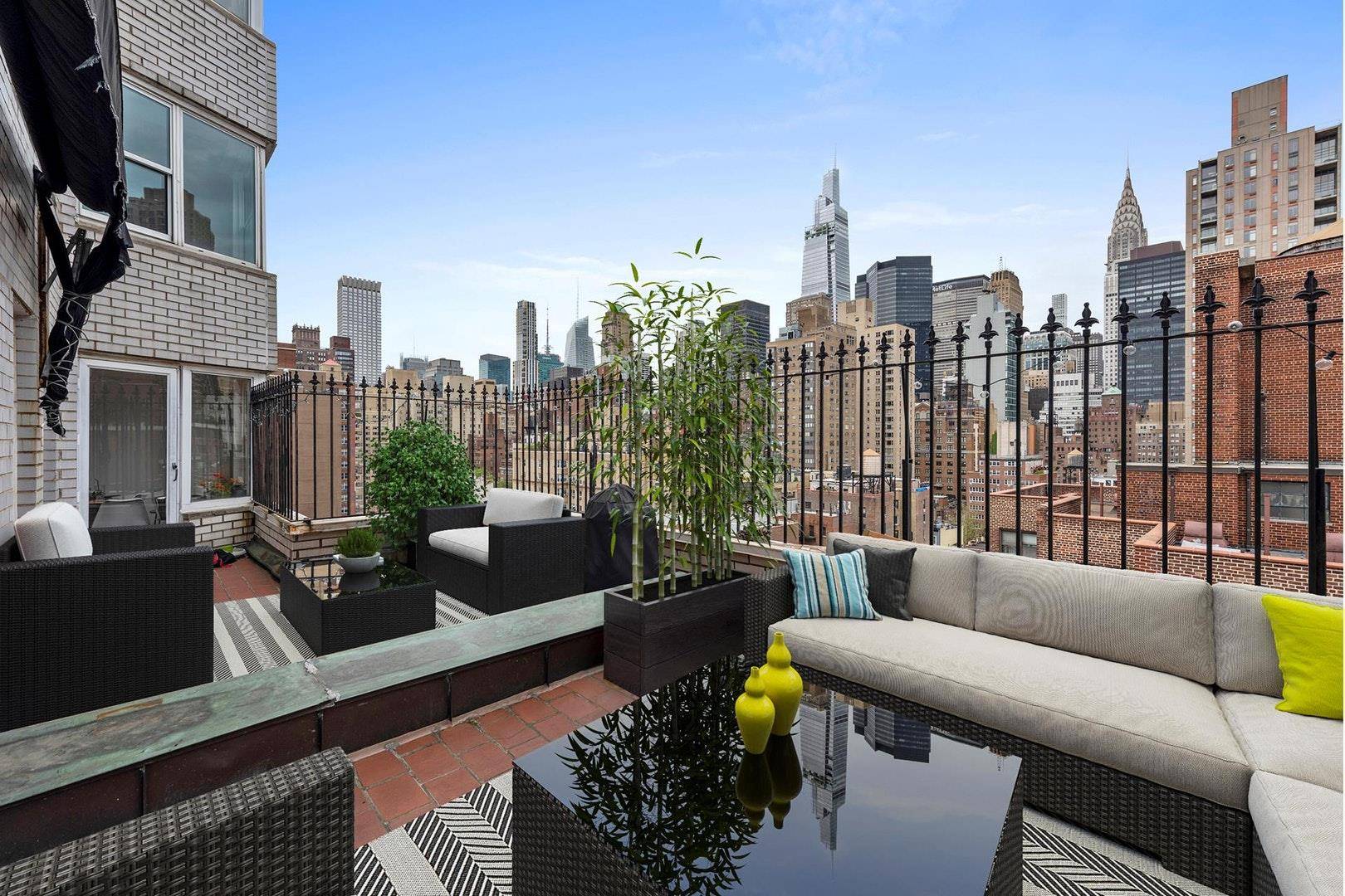 This rare high floor property with an amazing, oversized setback terrace offers drop dead views of Midtown landmarked Sky Scrapers and beyond.