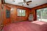 WOOD-PANELED FAMILY ROOM