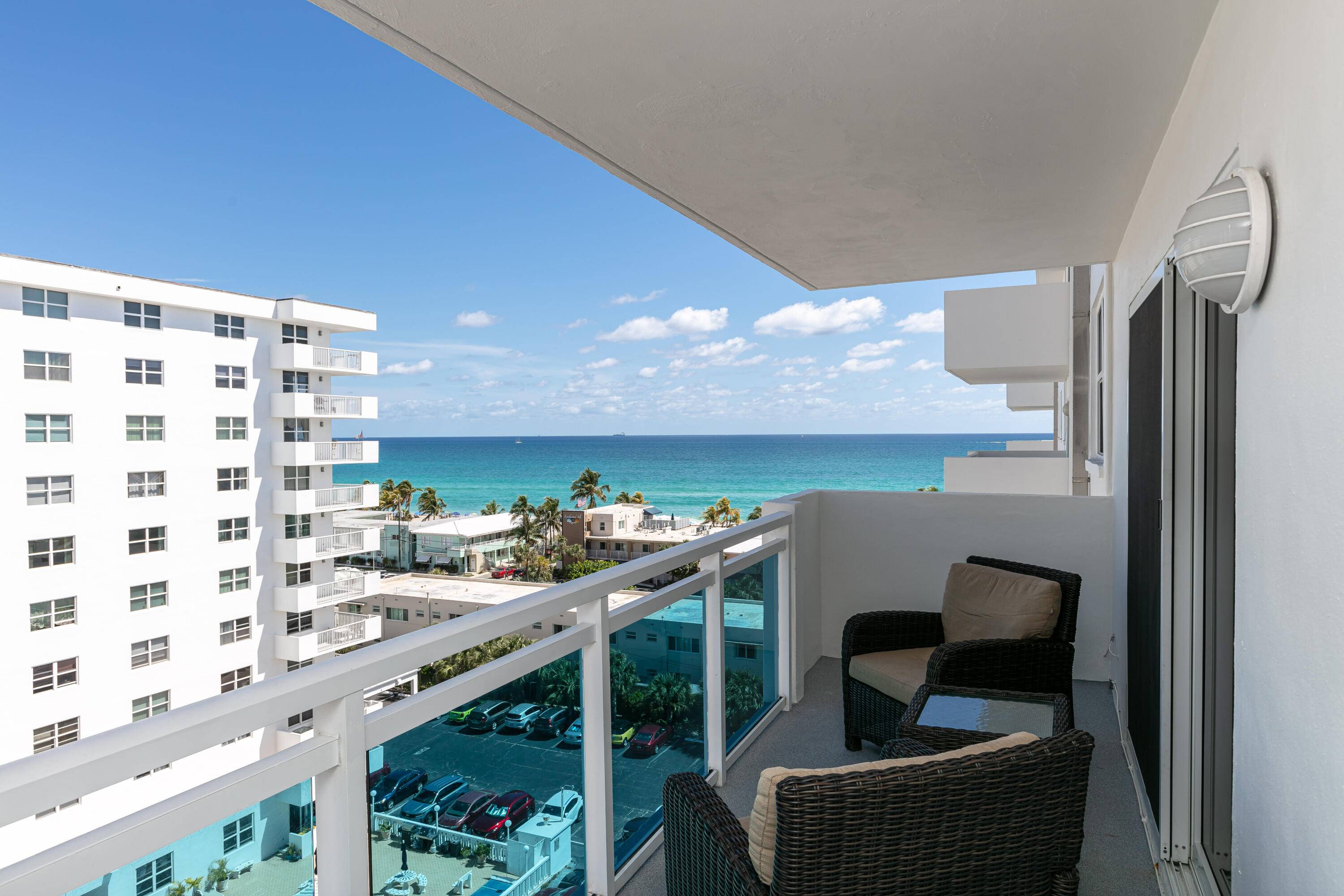 Enjoy Ocean and Intracoastal views from the covered balcony of this newly renovated Hollywood Beach condominium.
