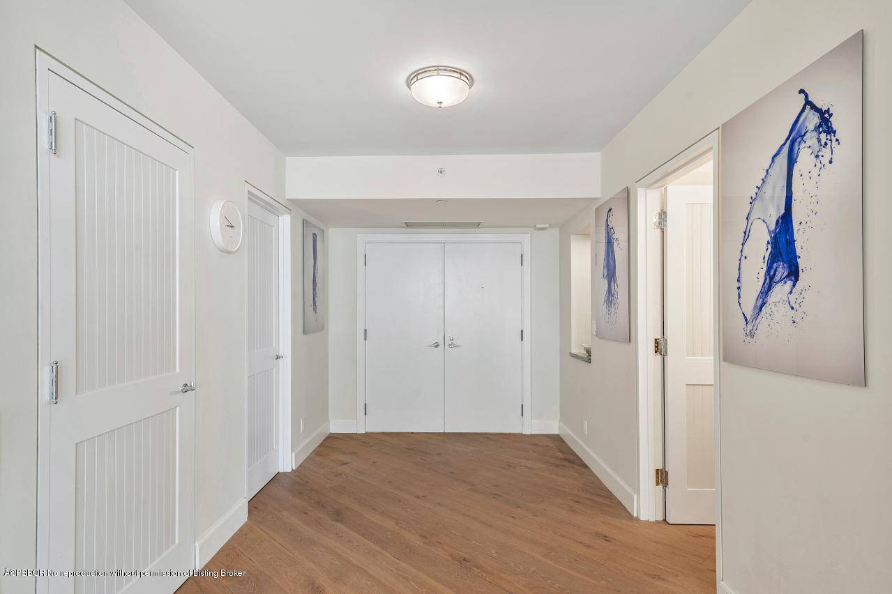 This property has been beautifully renovated with wood flooring, an open kitchen, guest powder room, a built in banquet dining table, large laundry, impact glass and a 45' south facing ...