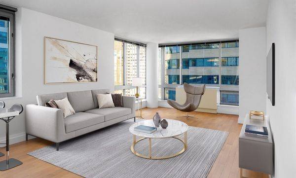 This corner 1BR 1BA unit has spectacular East River and southern views that overlook The Chrysler Building.