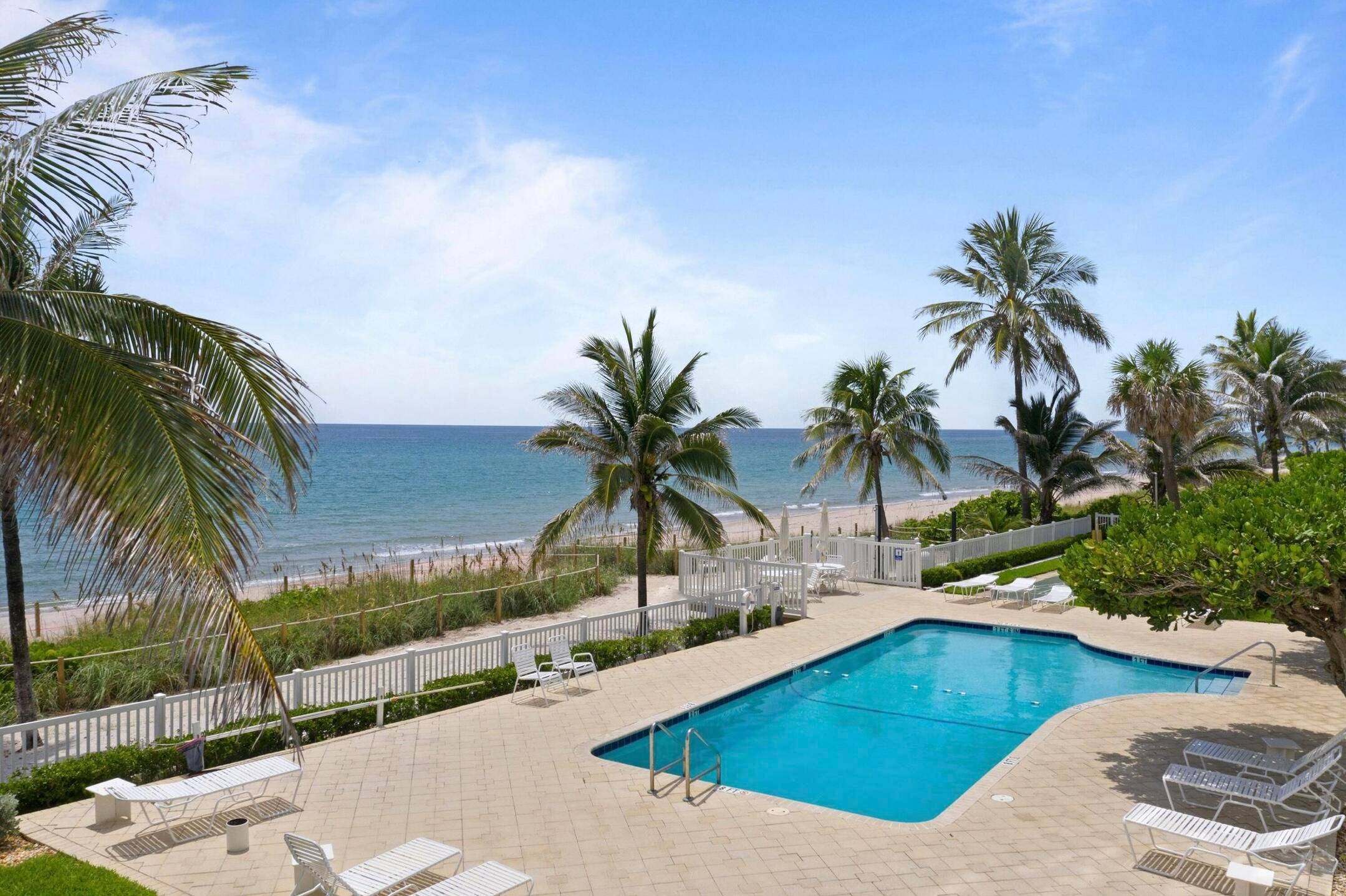Stunning 2 2 completely furnished corner condo directly on private, pristine Hillsboro Beach.