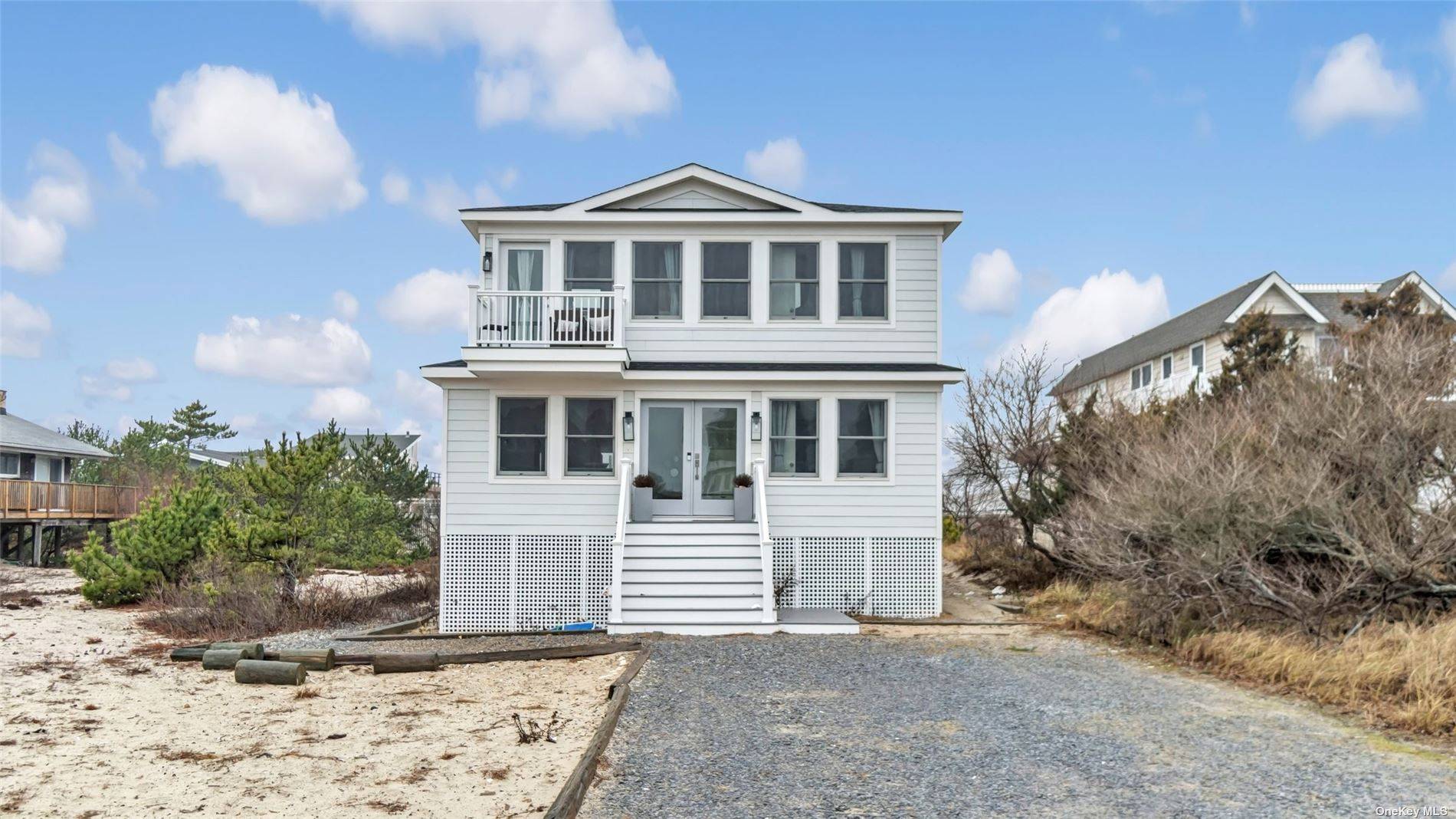 Don't miss this quintessential beach house with a stunning new renovation.