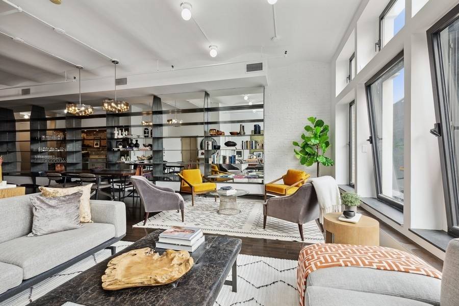 Stunning ! Rarely available full floor loft in a boutique style condominium rich with character, in the heart of historic Noho.