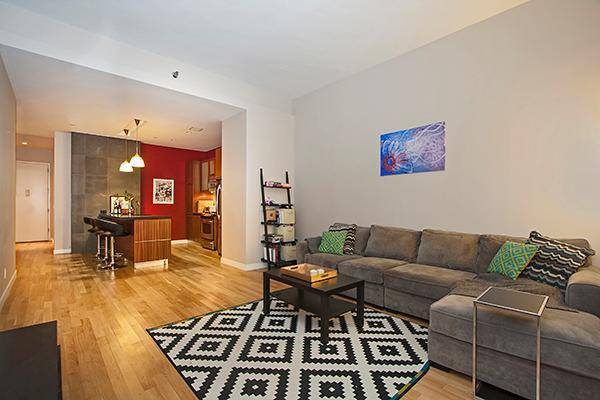 This pristine, sun drenched 1 bedroom plus office or convertible 2 bedroom features hardwood floors, 11 foot high ceilings, and over sized windows throughout.