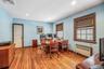 Office space with radiator, light wood-style floors, and recessed lighting
