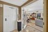 Foyer entry coming off the semi-private elevator w/ beautiful wall coverings. Door in front takes you to back hallway w/ trash chute, mechanical close