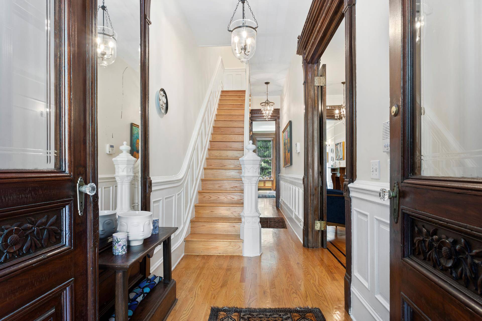 Beautifully renovated classic brownstone on a quiet, tree lined block of Harlem Historic District.