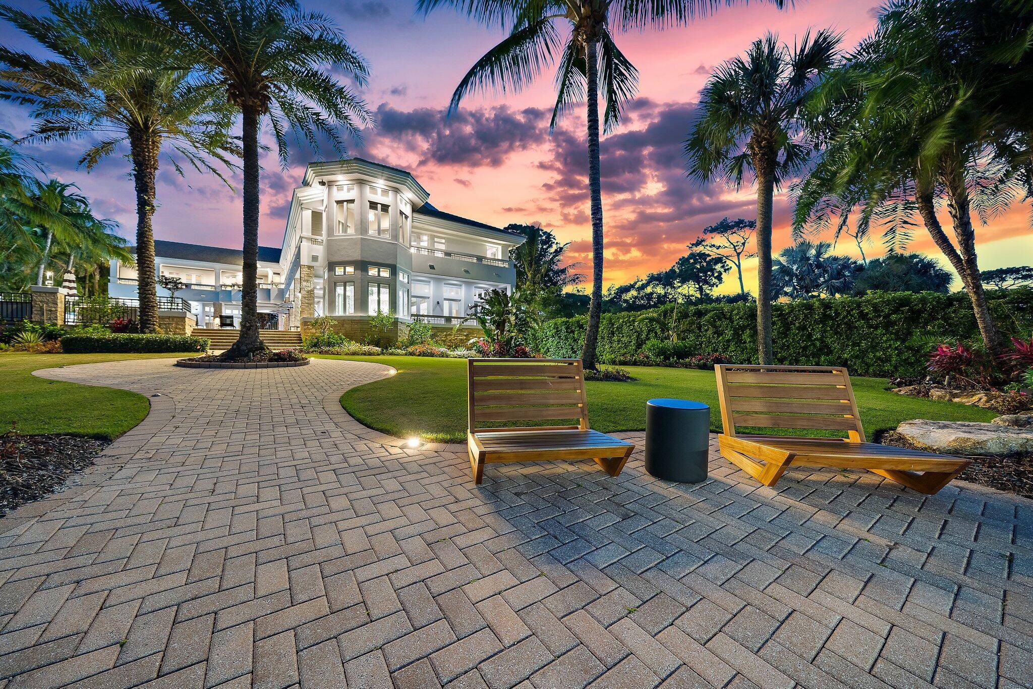 Where can you find an 8 bedroom, 9 bath home with over 9300 SF of AC space, 4 garages, directly on the Intracoastal Waterway with 105 feet of frontage in ...