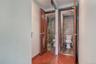 Full bath with a shower stall and wood finished floors
