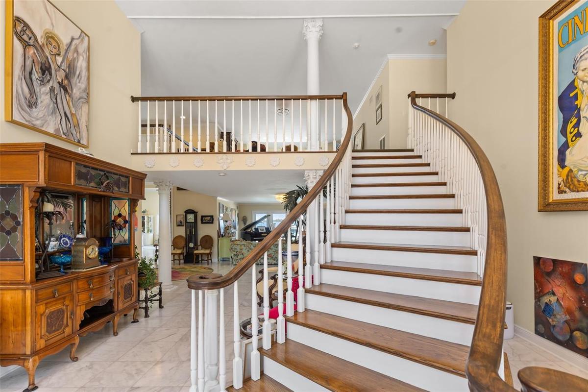 Ascend the grand staircase to the second level, where sweeping views overlooking the Manatee River as it flows toward the Gulf of America.