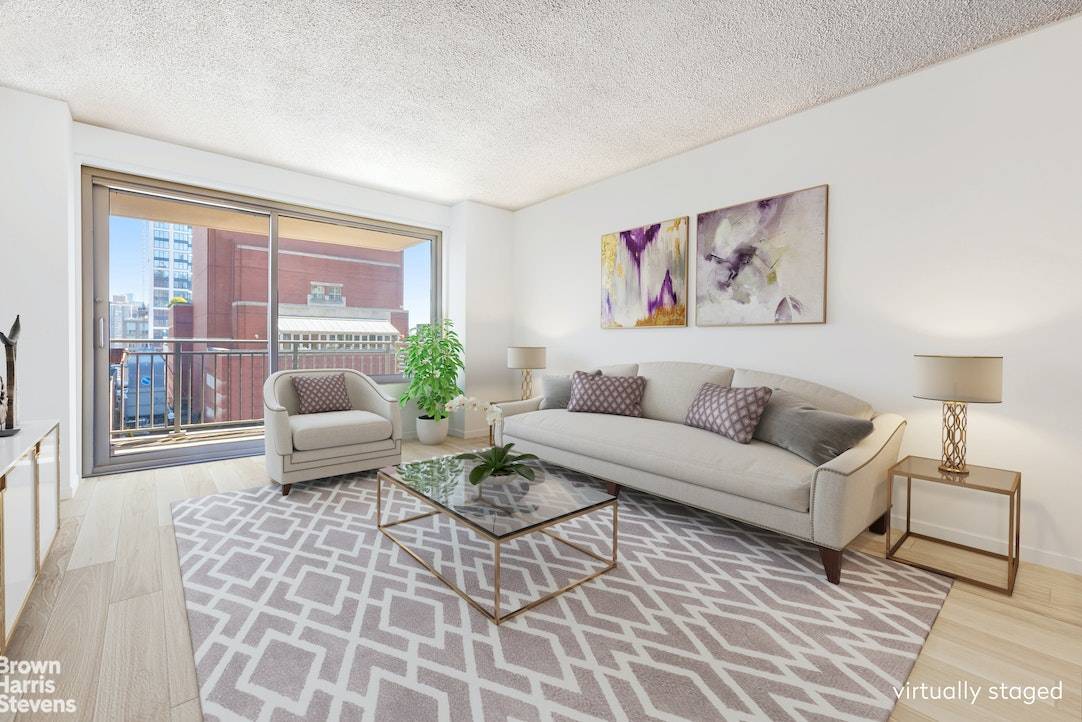 This delightful top floor 1 bedroom apartment features a large balcony, excellent eastern views including a peek of the East River and sunlight.