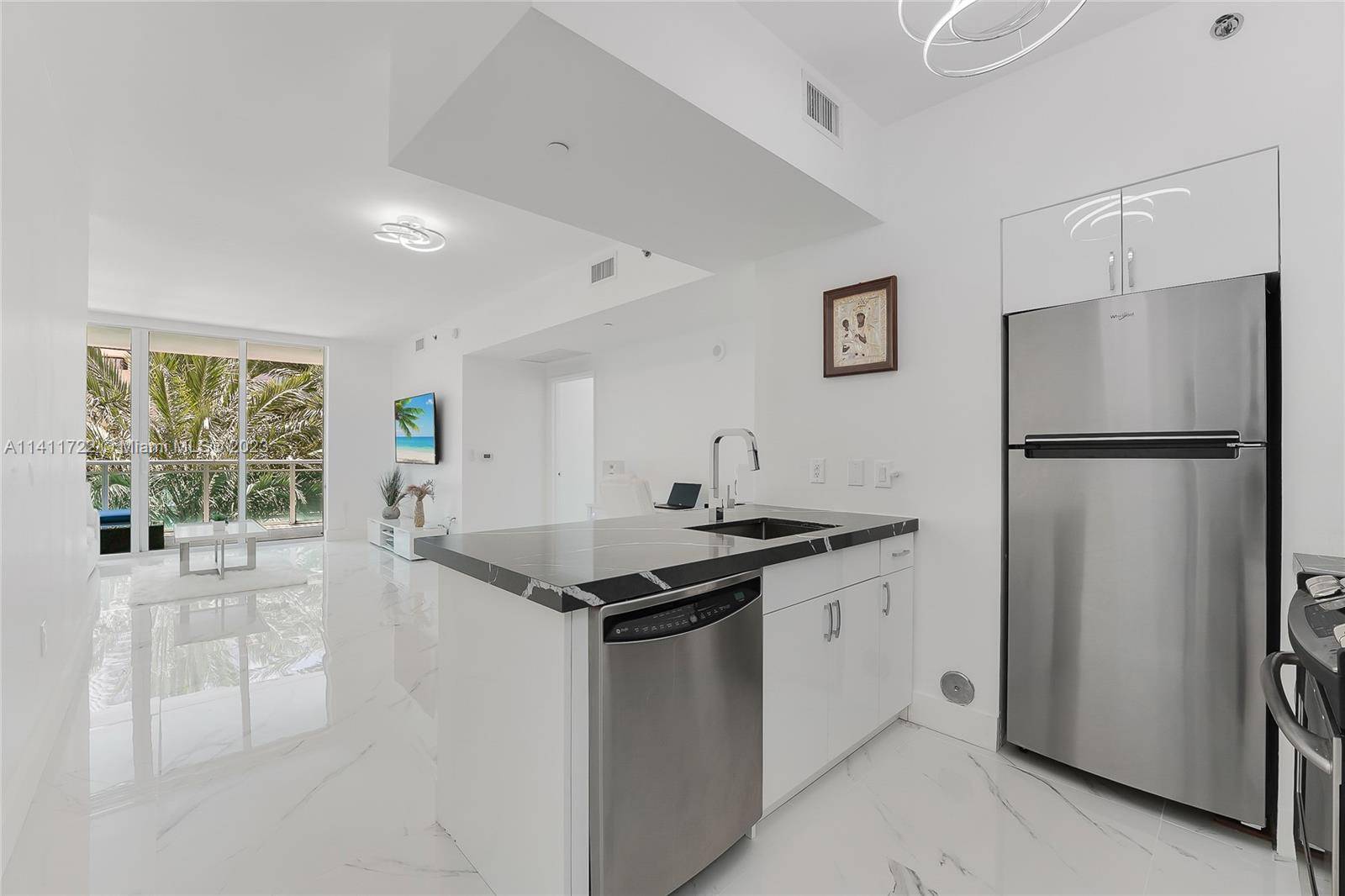 Completely remodeled corner residence in the very heart of Brickell !