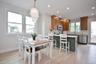 Dining room featuring light wood-style flooring and recessed lighting