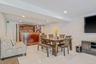 Dining area with recessed lighting and light tile patterned floors