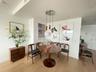 Dining room with hardwood / wood-style floors and baseboards
