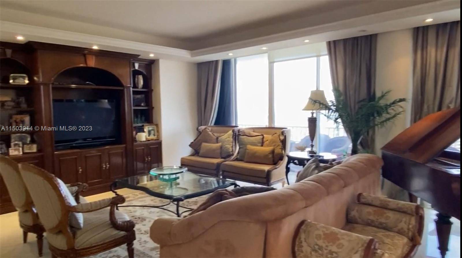 Experience Luxury in this Penthouse Duplex Unit, graced by a stunning staircase lofty ceilings.
