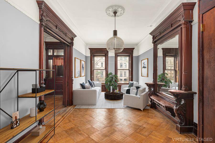 This prime Park Slope brownstone offers a blend of historic charm and modern comforts.