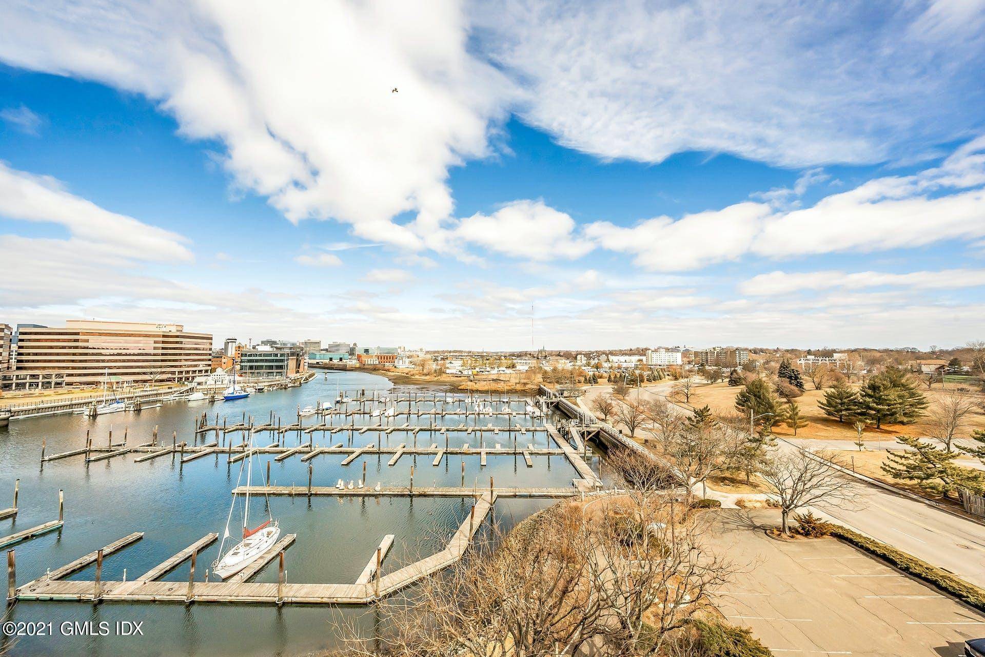 Situated on the top floor of Harbor House Condominiums in Stamford is this breathtaking waterfront two bedroom, two bathroom apartment.