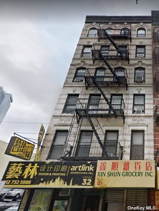 24 units in total 22 residential units and 2 commercial units 2 stores It is in Lower Manhattan just south of Chinatown.
