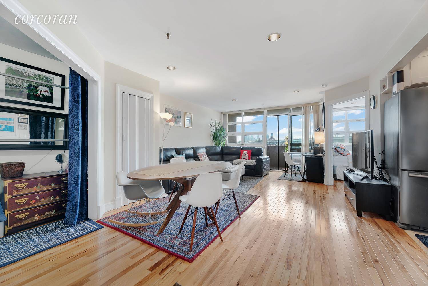 Spacious SW facing one bedroom apartment features private balcony with Manhattan Skyline and Astoria Park views, open floor plan, hardwood floors, renovated kitchen with full size stainless steel appliances and ...