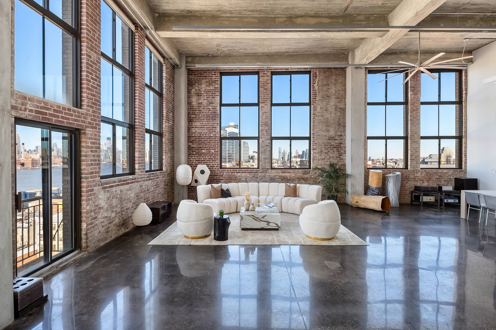 Gut Renovated Pre War Williamsburg Loft w Unobstructed Manhattan Skyline Views 18 foot ceilings, Japanese inspired primary loft suite, and high end finishes at the historic Esquire Building seconds from ...