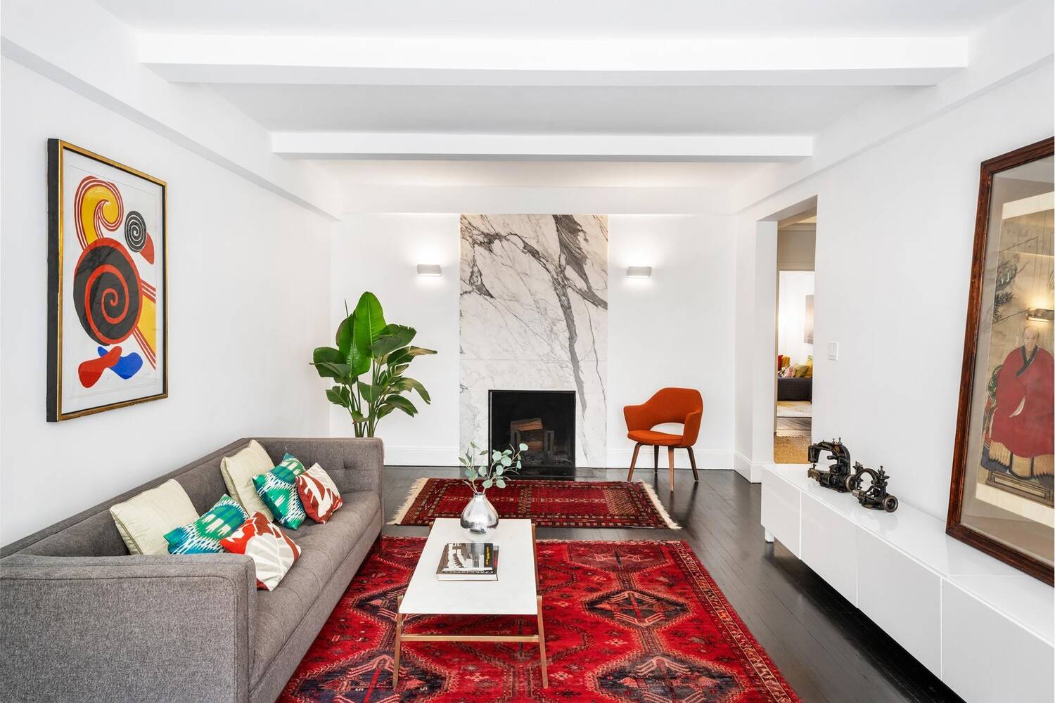 SUNNY, SLEEK AND CHIC This absolutely stunning, meticulously renovated 2 bedroom, 2 bathroom prewar home is flooded with natural light and overflowing with both 1920s character and 2020s understated elegance.