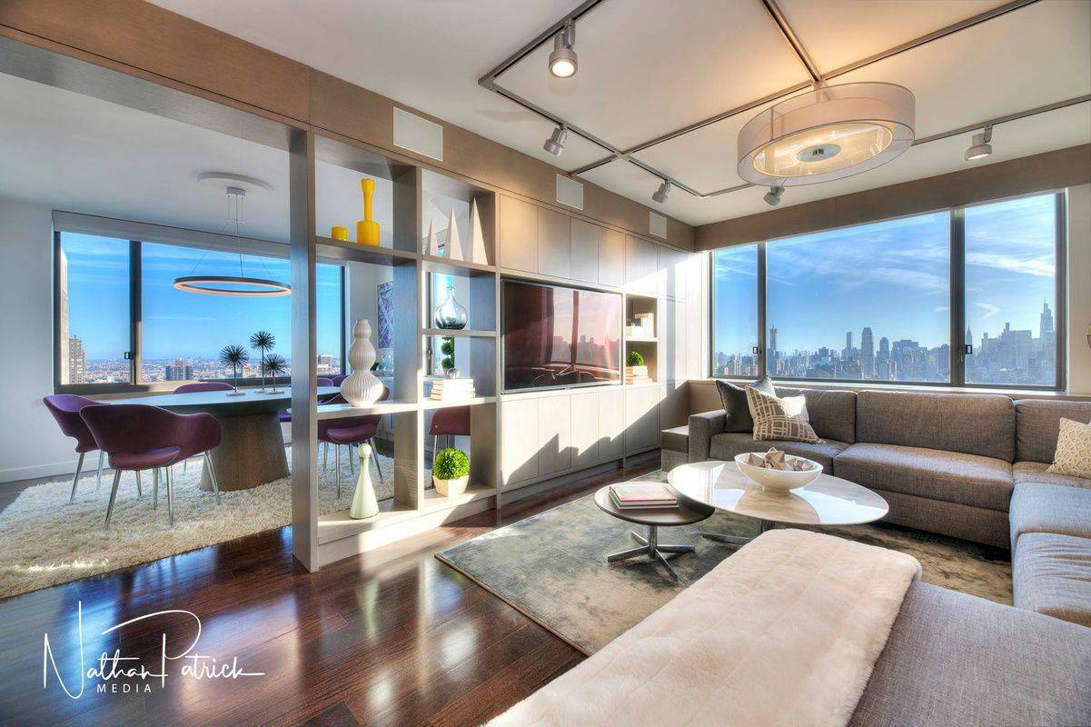 Have a CUSTOM experience by visiting this Penthouse level home to appreciate.