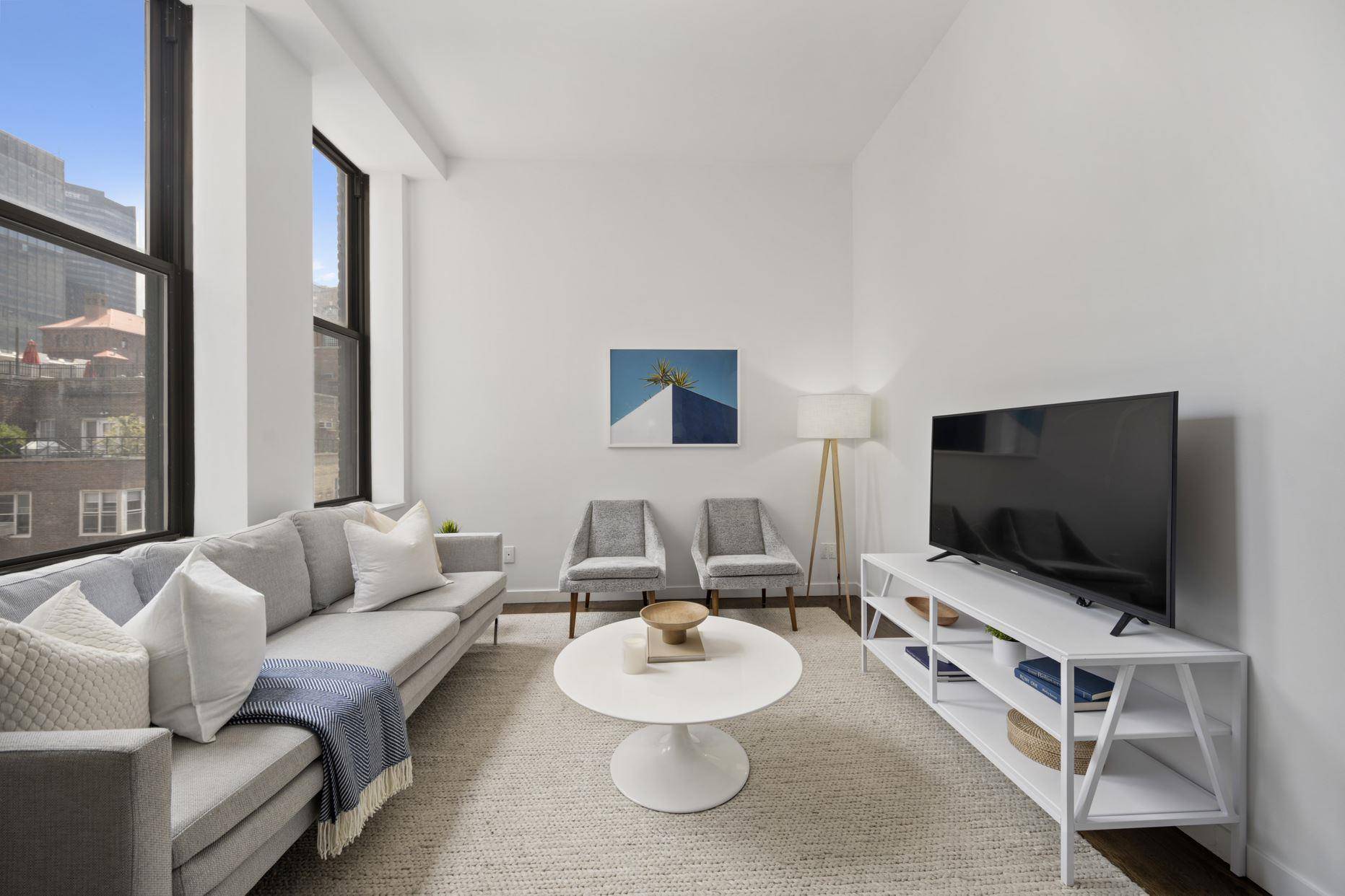 Stunning and spacious one bedroom loft apartment at 11 East 36th Street in prime Midtown South !